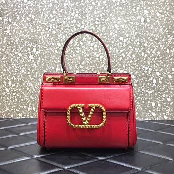 Valentino Garavani Rockstud alcove small top handle bag in red 23cm