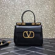Valentino Garavani Rockstud alcove small top handle bag in black 23cm - 1