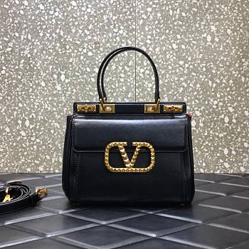 Valentino Garavani Rockstud alcove small top handle bag in black 23cm