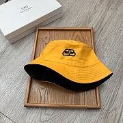 Balenciaga two sided bucket hat in yellow - 1