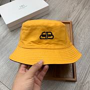 Balenciaga two sided bucket hat in yellow - 2