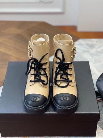 Chanel Lace-ups leather boots in beige/black