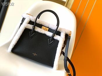 LV On My Side MM grained calf leather and shearling in black M58908 30.5cm