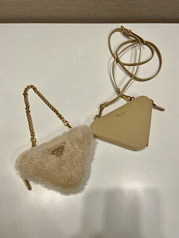 Prada Shearling and Saffiano leather mini-pouch Beige Size 15x10x5 cm
