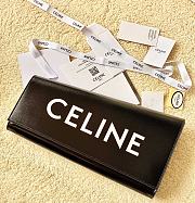 Celine asymetric clutch in shiny calfskin with celine print black Size 31.5x4x17 cm - 1