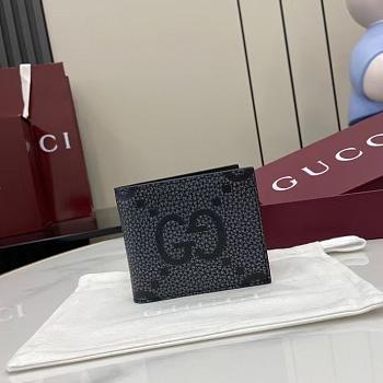 Gucci Maxi GG bi-fold wallet in dark grey and black leather