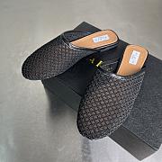 Alaia Flat-soled half-slippers in black - 3