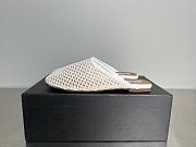 Alaia Flat-soled half-slippers in white - 1