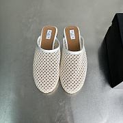 Alaia Flat-soled half-slippers in white - 4