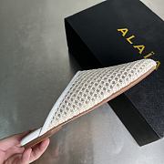 Alaia Flat-soled half-slippers in white - 3