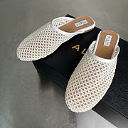 Alaia Flat-soled half-slippers in white - 2