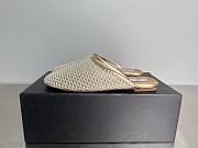 Alaia Flat-soled half-slippers in gold - 1