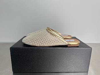 Alaia Flat-soled half-slippers in gold