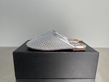 Alaia Flat-soled half-slippers in gray