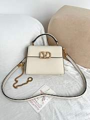 Valentino Garavani Vsling Mini Handbag In Laminated Grainy White - 1