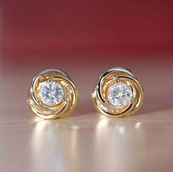 Cartier Trinity solitaire diamond stud earrings