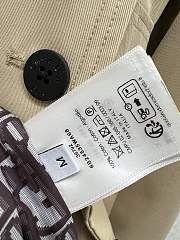 Dior trench coat features a lapel and belt 02 - 3