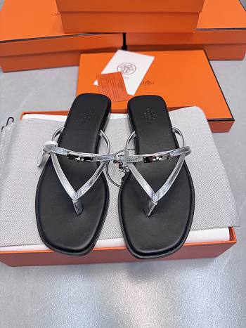 Hermes Kelly buckle flip-flops silver